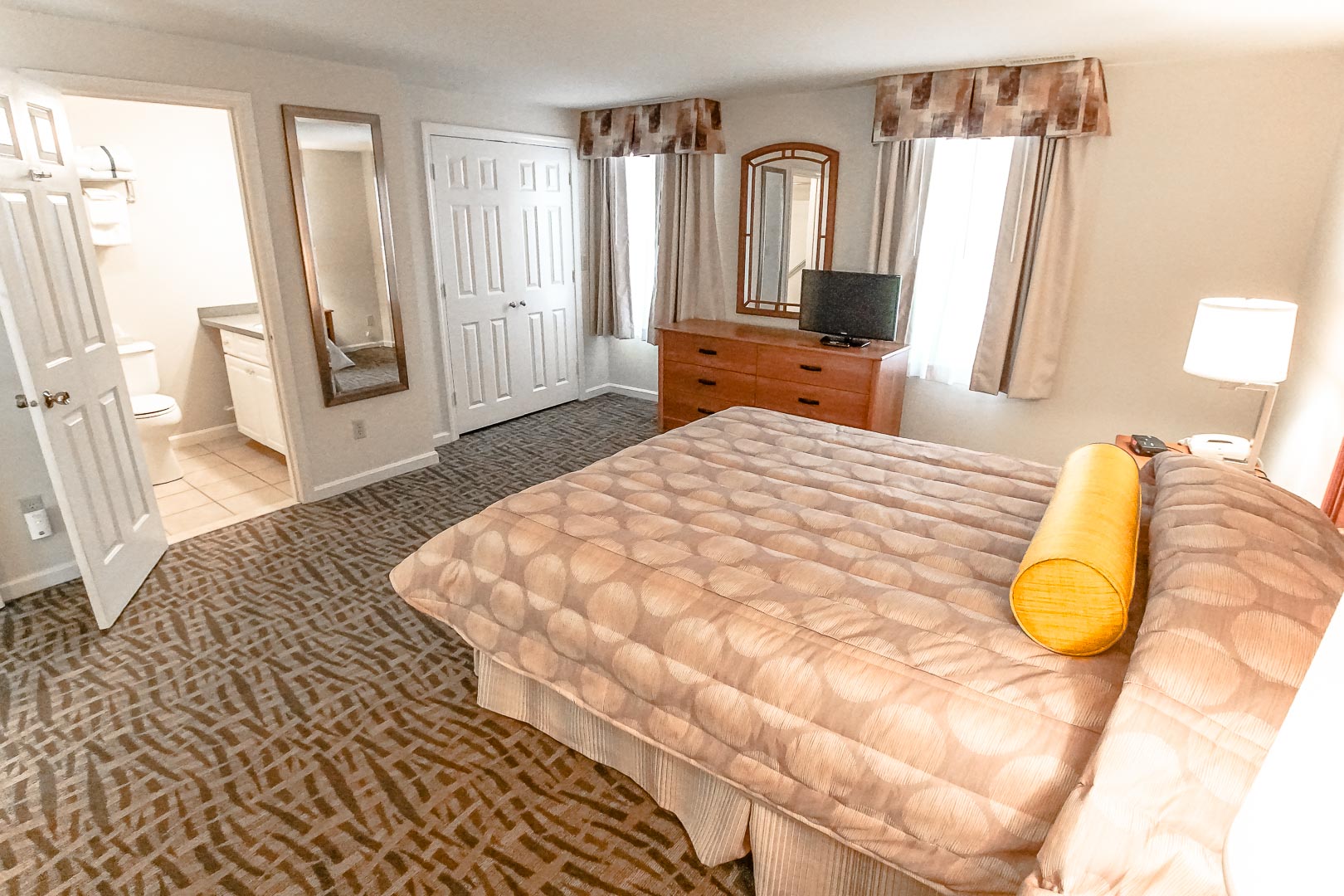 A charming master bedroom at VRI's Sea Mist Resort in Massachusetts.